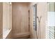 Walk-in shower with multiple shower heads and built-in seat at 5455 San Florentine Ave, Las Vegas, NV 89141
