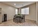 Small dining area with table and bench seating at 5835 Rustic Prairie St, Las Vegas, NV 89148