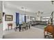 Open dining area with table, chairs, and view into living room at 6072 Isola Peak Ave, Las Vegas, NV 89122