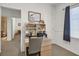 Home office with a desk and printer, near bathroom at 6072 Isola Peak Ave, Las Vegas, NV 89122