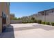 Large backyard with a paved patio area at 6788 Lavender Sky Ct, Las Vegas, NV 89142