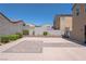 Landscaped backyard with a paved patio area at 6788 Lavender Sky Ct, Las Vegas, NV 89142