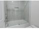 Clean bathroom with a glass-enclosed tub and shower at 6788 Lavender Sky Ct, Las Vegas, NV 89142