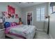 Charming bedroom with a stylish bed and walk-in closet at 6788 Lavender Sky Ct, Las Vegas, NV 89142