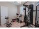 Home gym with various workout equipment including a punching bag at 6788 Lavender Sky Ct, Las Vegas, NV 89142
