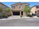 Two-story house with attached garage and landscaping at 6788 Lavender Sky Ct, Las Vegas, NV 89142