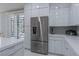 Modern kitchen with stainless steel appliances and white cabinetry at 6788 Lavender Sky Ct, Las Vegas, NV 89142