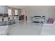 Open concept living area with kitchen and dining views at 6788 Lavender Sky Ct, Las Vegas, NV 89142