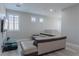 L-shaped sectional sofa in the living room at 6788 Lavender Sky Ct, Las Vegas, NV 89142