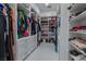 Large walk-in closet with ample shelving and hanging space for clothes and shoes at 6788 Lavender Sky Ct, Las Vegas, NV 89142