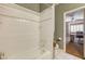 Bathroom with shower/tub combo and view of an office at 7015 N Jensen St, Las Vegas, NV 89149