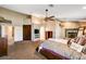Main bedroom with a king-size bed and views of the bathroom and other rooms at 7015 N Jensen St, Las Vegas, NV 89149