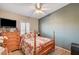 Charming bedroom with a floral-themed bed at 7015 N Jensen St, Las Vegas, NV 89149