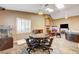 Separate dining area with a game table and chairs near a birdcage at 7015 N Jensen St, Las Vegas, NV 89149