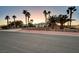 House exterior with palm trees and driveway at 7015 N Jensen St, Las Vegas, NV 89149