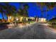 Elegant single-story home with landscaped yard and a long driveway at 7015 N Jensen St, Las Vegas, NV 89149
