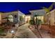 Front entry and walkway with landscaping and lighting at 7015 N Jensen St, Las Vegas, NV 89149