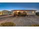 Single story home with attached garage and wooden deck at 7015 N Jensen St, Las Vegas, NV 89149