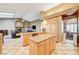 Open kitchen with breakfast bar and views into Gathering room at 7015 N Jensen St, Las Vegas, NV 89149