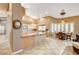 Open kitchen with island and breakfast nook area at 7015 N Jensen St, Las Vegas, NV 89149