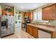 Kitchen has stainless steel appliances and lots of cabinet space at 7015 N Jensen St, Las Vegas, NV 89149