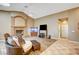 Living room with fireplace and comfortable seating at 7015 N Jensen St, Las Vegas, NV 89149