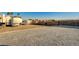 Gravel parking area with space for RV and boat at 7015 N Jensen St, Las Vegas, NV 89149