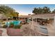 Lush pool area with pergola and seating at 7015 N Jensen St, Las Vegas, NV 89149