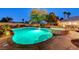 Stunning pool and spa with night lighting and landscaping at 7015 N Jensen St, Las Vegas, NV 89149