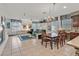 Bright living and dining area with tile floors and fireplace at 8216 Wooden Windmill Ct, Las Vegas, NV 89131