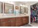 Double vanity bathroom with ample storage and closet at 9217 Longhorn Falls Ct, Las Vegas, NV 89149