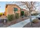 Single-story home with a two-car garage and desert landscaping at 9217 Longhorn Falls Ct, Las Vegas, NV 89149