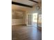 Bright living room with wood-look floors and access to backyard at , Las Vegas, NV 89107