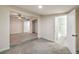 Primary bedroom with carpet, ceiling fan, and en-suite bathroom at 1408 Palm St, Henderson, NV 89011