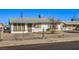 House exterior with chain link fence and small front yard at 1408 Palm St, Henderson, NV 89011