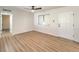 Living room featuring hardwood floors and a white door at 1408 Palm St, Henderson, NV 89011