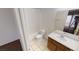 Clean bathroom with shower/tub combo, vanity, and tile floor at 1420 Arlington Heights St, Las Vegas, NV 89110