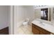 Clean bathroom with shower/tub combo, vanity, and tile floor at 1420 Arlington Heights St, Las Vegas, NV 89110