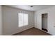 Spacious bedroom featuring a mirrored closet and neutral walls at 1420 Arlington Heights St, Las Vegas, NV 89110