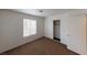 Bedroom with carpet, window, and sliding closet doors at 1420 Arlington Heights St, Las Vegas, NV 89110