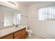 Bathroom with single vanity, toilet and bathtub at 1473 Teddington Ct # 101, Las Vegas, NV 89102