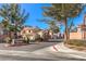 Community entrance with gate and landscaping at 1473 Teddington Ct # 101, Las Vegas, NV 89102