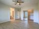 Spacious bedroom featuring modern flooring, ceiling fan, and a walk-in closet at 1510 Fieldbrook St, Henderson, NV 89052