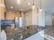 Modern kitchen with stainless steel appliances and granite countertop at 1510 Fieldbrook St, Henderson, NV 89052