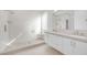 Modern bathroom with walk-in shower and double vanity at 1645 Warrington Dr, Henderson, NV 89052