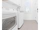 Bright laundry room with washer, dryer, and sink at 1645 Warrington Dr, Henderson, NV 89052