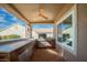 Outdoor kitchen with grill, sink, and granite countertop at 1645 Warrington Dr, Henderson, NV 89052