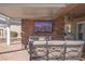 Outdoor patio with seating and fireplace at 1645 Warrington Dr, Henderson, NV 89052