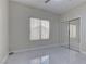 Well-lit bedroom with a mirrored closet and window at 1656 Black Fox Canyon Rd, Henderson, NV 89052