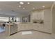 Bright kitchen with white cabinets and stainless steel appliances at 1656 Black Fox Canyon Rd, Henderson, NV 89052